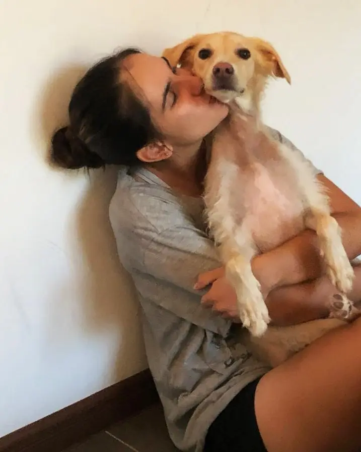 Naraa with her dog Vaya, a Mauritian rescue adopted in 2024